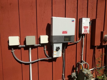 Inverter, combiner box, and disconnect
