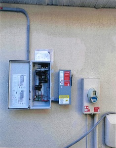 Combiner box and solar AC disconnect