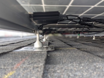 Optimizers installed under the panels