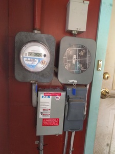 Utility meter with AC disconnect