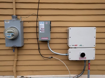 Inverter and AC disconnect on the house