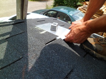 Installing PV mounts on the porch roof