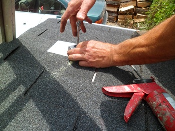 Installing PV mounts on the porch roof