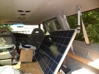Loading the panels in the van