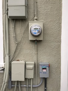 Bi-directional meter and solar disconnect