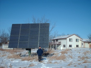 Homeowner with finished solar installation