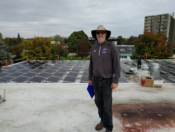 Solar contractor watching over the installation