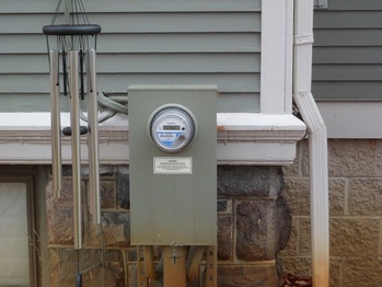 Utility meter on the back of the house