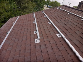 Flashing and rails on the North roof