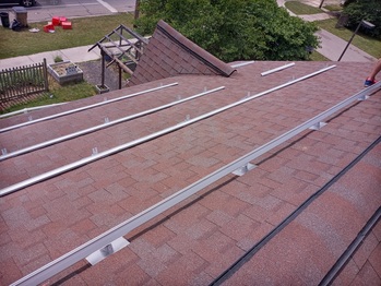 Flashing and rails on the South roof