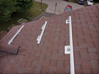Flashing and rails on the South roof