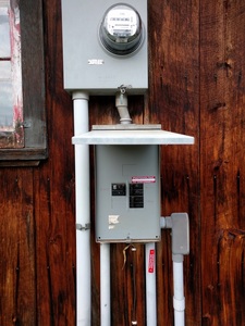 Utility meter and distribution subpanel
