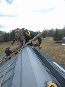 Attaching the rails to the roof