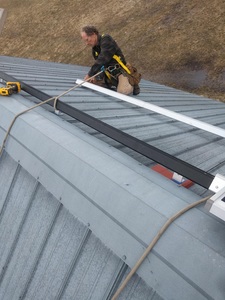 Attaching the second rail to the roof