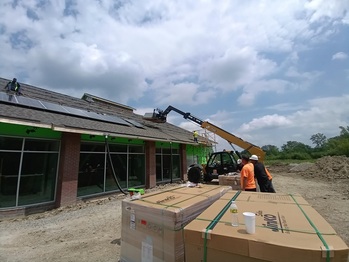 Bringing the panels to the roof