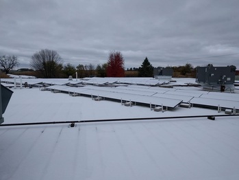 Snow covered solar panels