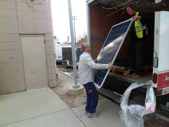 Unloading  the solar panels