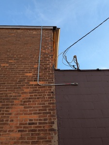 Conduit bringing the power from the roof