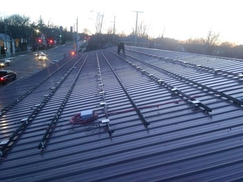 Expansion: Early morning, rails and optimizers installed